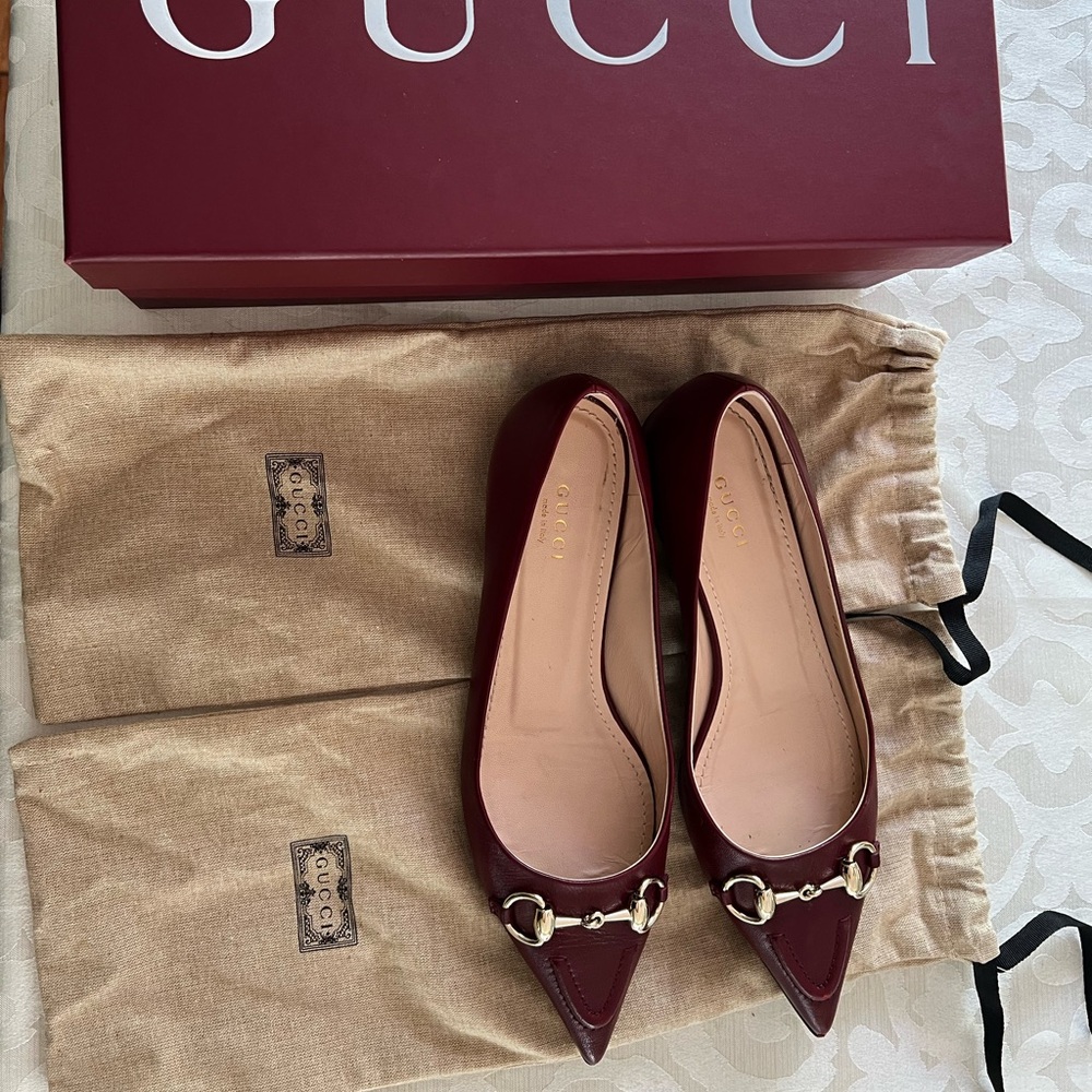 Gucci Burgundy Flats with Gold Detailing